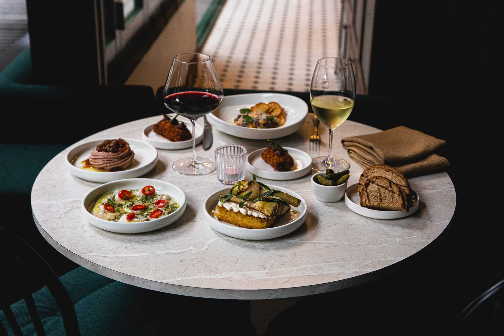 European plates and wine set for sharing at South City Wine