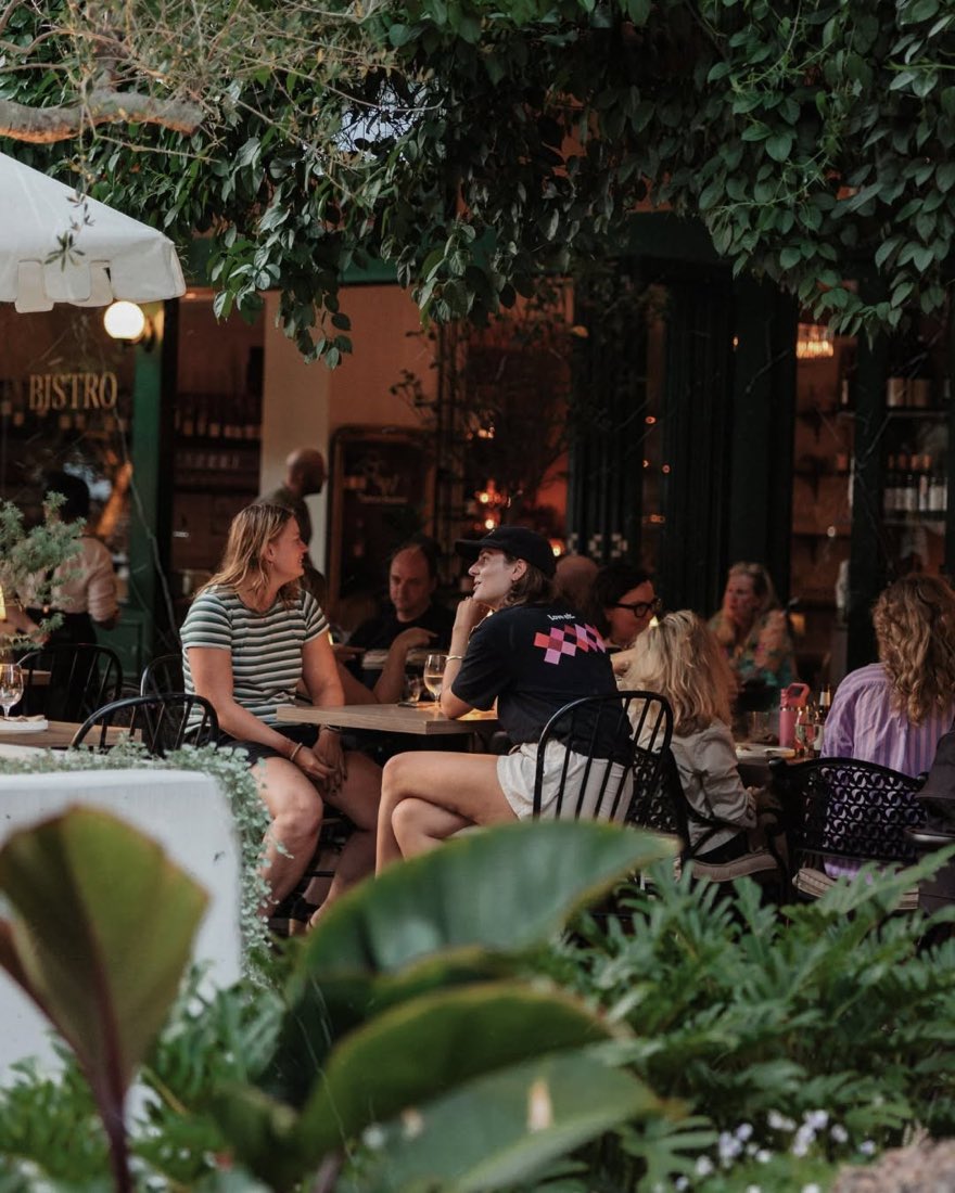 Guests at the leafy South City Wine terrace in Woolloongabba